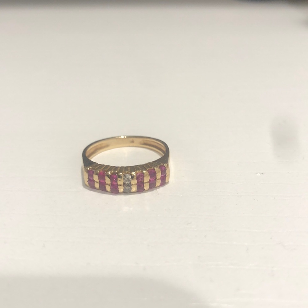 Vintage Pink sapphires with two small diamonds